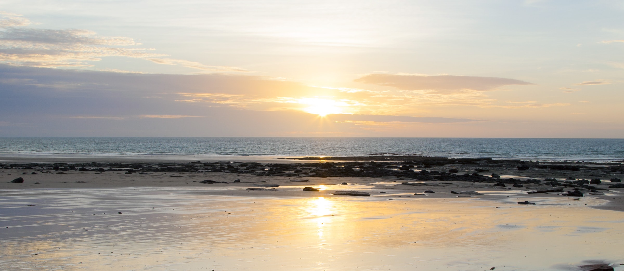 Serene sunset over Australian coastline.